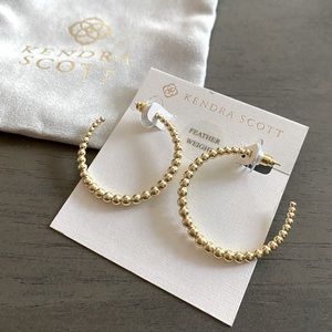 New, never worn, comes with bag